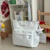 Bolsa de mano estilo japonés para chica dulce con estampado de estrellas, práctica y versátil para estudiantes de secundaria, perfecta para sesiones de tutoría, con una estética suave y artística, una bolsa de hombro