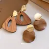 Novos Brincos Studs Geométricos de Madeira com Pino de Prata Retro Chinês Brincos Modernos Versáteis Ornamentos de Orelha de Luxo Leve High-End Atacado