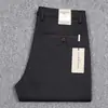 Marca de alta gama antiarrugas para hombre, primavera y otoño, ropa formal de negocios, pantalones de hombre, pantalones rectos elásticos, otoño e invierno, pantalones casuales de grosor medio, moda