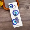Nuevo llavero transfronterizo con colgante de elefante, palmera y pavo con ojos azules, para bolso o coche.