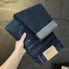 Jeans de Alta Gama Otoño para Hombre Pantalones Casuales Rectos Sueltos Primavera y Otoño 2026 Nuevo Estilo Juvenil Versátiles Elásticos Largos