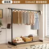Perchero simple de pie para uso doméstico, adecuado para dormitorios, con diseño móvil, tendedero interior, perchero de una barra para ropa y sombreros para dormitorios
