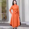 Abrigo de cuero con cordones de doble botonadura de longitud media para mujer Haining, gabardina elegante, nueva chaqueta de piel de oveja para otoño e invierno
