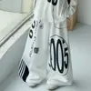 Conjunto de Baile Urbano Americano para Niñas 2026 Otoño Nuevo Estilo para Niños Mayores, Camiseta Estampada de Manga Larga y Pantalones de Pierna Ancha Conjunto de Baile Hip-Hop Jazz