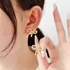 Pendientes de Aro con Lazo de Acero Inoxidable y Oro de 18 Quilates Personalizados de Alta Gama Europeos y Americanos Estilo Retro Francés Venta al por Mayor