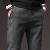 En nombre de ruffian guapo al por mayor pantalones casuales de otoño e invierno nuevos pantalones sueltos para hombre tubo recto pantalones de negocios de alta gama para jóvenes