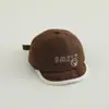 Gorras Suaves de Ala Versátil Estilo Americano al por Mayor para Bebés y Niños Pequeños, Nuevas Gorras de Béisbol para Bebés para Exteriores, Gorras de Sol de Dibujos Animados con Letras para Otoño