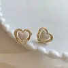 Pendientes de alto diseño pendientes de flor blanca de verano temperamento retro francés diseño único de nicho estilo nuevo