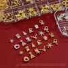 Nuevas Joyas para Uñas Oro y Plata Navidad 12 Rejillas Aleación Estéreo Copo de Nieve Blanco Reno Joyas para Uñas Venta al por Mayor