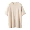 Camiseta de cachemir minimalista y relajada de manga corta para mujer, silueta holgada, cuello redondo, top de punto versátil y favorecedor.