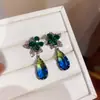 Aretes de aguja plateada con diamantes, diseño de flor ovalada de resina y gota de agua, estilo retro vintage, aretes versátiles