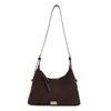 Bolso de Hombro Único de Gamuza Retro para Mujer 2026 Nuevo Simple Versátil para Viajar Bolso Cruzado Gran Capacidad Bolso de Cuero Suave Nicho