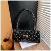 Bolso de Hombro y Axila de Punto de Lunares de Alta Gama Estilo Coreano Transfronterizo para Mujer 2026 Primavera Nuevo Bolso Cilindro Simple de Moda