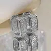 Venta caliente transfronteriza europea y americana lujo ligero micro incrustación de circonita hebilla de oreja pendientes de moda para mujer simples Joyería de alto nivel estilo popular