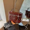 Bolsas femininas transfronteiriças outono 2026 nova tendência estilo Chanel acolchoada com corrente bolsa de mão bolsa de ombro transversal