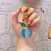 Llavero Pequeño de Manzana Electrochapada Colgante de Corazón Iridiscente para Bolsos Regalo Pequeño Creativo Regalos Pequeños de Acrílico Venta al por Mayor