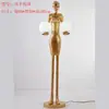 Lámpara de escultura abstracta de bola de personaje Lámpara de sala de exposiciones lámpara de oficina de ventas de hotel Lámpara de decoración artística lámpara de león lámpara de pie con forma humana