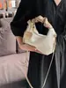 Bolso de mano vintage de rayas verticales transfronterizo para mujer, nueva moda de invierno 2025, bolso versátil de hombro y cruzado para mujer, en stock