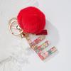 Llavero colgante con letra de pieza de fruta de resina transparente transfronteriza, llavero colgante de bola de pelo roja de moda personalizado