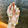 Colgante de Cadena para Teléfono con Cuentas de Rosquilla Llavero para Coche Encanto Lindo para Bolso Pulsera Accesorios Regalo Venta al por Mayor