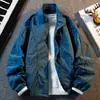 Chaqueta impermeable y cortavientos de primavera para hombre, adecuada para primavera y otoño, una opción de abrigo casual y versátil para hombres jóvenes.