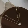Cadena Clavicular Elegante para Mujer con Baño de Oro Real y Circonita Microincrustada, Collar de Corazón de Doble Capa con Diseño de Nicho, Cadena para el Cuello Estilo Europeo y Americano