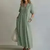 Vestido longo casual folgado de manga curta com decote V e cor sólida plissado, moda feminina transfronteiriça europeia e americana 2026