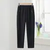 Pantalones Casuales Gruesos de Terciopelo Nuevos 2025 de Cintura Alta para Madres de Mediana Edad y Mayores con Cintura Elástica y Pantalones Rectos Sueltos