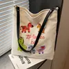 Bolsa de Lona Bordada Transfronteriza para Mujer 2026 Nuevo Bolso de Mano de Gran Capacidad Bolso Tote Casual de Hombro de Nicho para Viajes