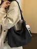 Bolsas de nicho Shuai Mi Jia, bolsa feminina de grande capacidade, mochila modelo 2026 novo, bolsa de ombro tote casual fashion