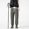 Pantalones Casuales Nuevos Primavera/Verano 2026 Estilo Urbano Outdoor para Pareja Pantalones Cortavientos de Todas las Estaciones con Doble Cremallera