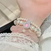 Pulsera de Cristal Blanco Natural con Lazo, Pulsera de Doble Capa, Lujo Ligero, Sensación de Alta Gama, Diseño de Nicho, Joyería de Perlas Swarovski para Mujer