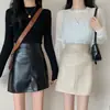 Falda de línea A 2026 otoño nuevo falda corta de cuero falda midi estilo primavera y otoño falda ajustada a la cadera para mujer cintura alta PU falda corta de otoño e invierno