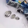 Botones Metálicos de Alto Gama Exquisitos para Abrigos, Estilo Europeo y Americano, Círculo Minimalista de Metal con Textura Cóncava y Convexa, Hueco Irregular Ovalado, Nicho