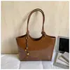 Bolsa de Hombro Personalizada Simple y de Moda Estilo Nuevo Primavera 2026 Bolso Casual con Textura de Gran Capacidad Bolso Tote para Mujer