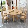 Mesa de jantar redonda de madeira maciça estilo chinês, adequada para uso doméstico, com cooktop de indução embutido e bandeja giratória, também disponível como mesa de jantar redonda esculpida estilo hotel