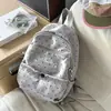 Mochila versátil de nicho estilo coreano para estudantes universitárias, mochila leve 2026 na moda estilo ins, novo modelo