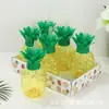 Venta al por mayor del fabricante Celebridad de Internet Taza con popote creativa con forma de piña para mascotas Caja de exhibición de empaque para bebidas de jugo Taza de piña