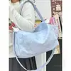 Bolso de viaje de un solo hombro versátil de estilo fresco, bolso deportivo casual simple y versátil, bolsa de almacenamiento para ropa de viaje