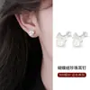 Aretes de perla y moño con aguja de plata pura S999 para mujer, nuevo modelo popular 2026, joyería de alta gama para perforación de orejas