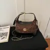 Bolsa vintage de camurça de nicho para mulheres, bolsa transversal versátil e estilosa com corrente matelassê, bolsa de ombro e sob o braço com color-blocking da moda
