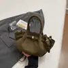Novo modelo de outono de 2026, estiloso e elegante, alta-costura, bolsa de mão atraente, bolsa de balde de cor sólida da moda