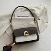 Bolso de axila de diseño vintage de nicho, nuevo y moderno bolso de sillín de moda, bolso de hombro simple, casual y versátil