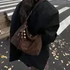 Bolsa para lonchera de axila relajada coreana nicho retro patchwork de gamuza bandolera de un solo hombro bolso de bola de masa estampado de leopardo moderno