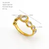 Anillo de diamante de acero inoxidable europeo y americano transfronterizo para mujer, moderno y sencillo, oro vintage de 14k con múltiples piedras de zirconia redondas