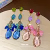 Aretes de aguja plateada con lentejuela redonda de cristal tachonada de diamantes en forma de lágrima, un toque de lujo y sofisticación, con diseños de borlas, aretes de moda y elegantes para mujer