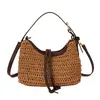 Bolso de Paja de Verano de Nicho 2026 Modelo Nuevo Bolso de Mano para Mujer para el Trabajo Bolso Cubo Casual Elegante para el Trayecto