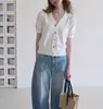 Top corto de punto de seda helada estilo vintage francés con cuello en V y manga corta para mujer, entallado a la cintura en verano, de alta gama, rejuvenecedor, fino, de corte holgado