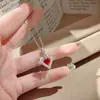 Collar Colgante Corazón de Durazno Blanco Cupido Incrustado con Anillo en Forma de Corazón Paraíba Juego de Gemas para Mujer