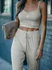Novo conjunto de duas peças de calça jogger de yoga feminina transfronteiriça, estilo europeu e americano, calça fitness que levanta o bumbum, modelagem justa, emagrecimento, calça esportiva de nove pontos